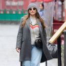 Kelly Brook – Wears festive jumper and faded denim jeans at Heart radio in London