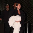 Chrissy Teigen – With John Legend check out of their New York hotel
