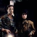 Arnold Schwarzenegger and Rachel Ticotin