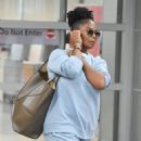 Janet Jackson – Seen at JFK airport in NYC - 454 x 499