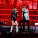 Last night (March 13, 2023), Axl joined Carrie Underwood on stage for his show at Crypto.com Arena in Los Angeles, CA - 454 x 450