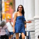 Famke Janssen – Dons striped blue mini dress in SoHo – New York