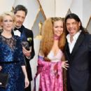 Producer Cara Speller, guest, Chloe Trujillo and musician Robert Trujillo attend the 89th Annual Academy Awards at Hollywood & Highland Center on February 26, 2017 in Hollywood, California - 454 x 303