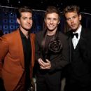 Andrew Garfield, Eddie Redmayne and Austin Butler  at the 80th Golden Globe Awards on January 10, 2023, in Beverly Hill, CA