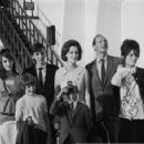 July 29th, 1963 - The Rt Hon Sir David Ormsby-Gore KCMG went aboard the Queen Mary on her arrival today at Southhampton with his children Julian (22, dark glasses), Jane (20) and Victoria (16) to meet his wife Lady Ormsby-Gore, daughter Alice (11, with co