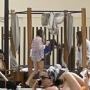 Brandi Cyrus – Seen as she sits poolside after dj gig in Las Vegas - 454 x 591