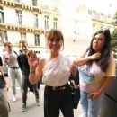 Alyssa Milano  "gets a warm welcome from fans as she arrives in Paris"