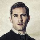 Chaplain Henry Hopkins has a dark past and is newly committed to God and his work. Chaplain Hopkins is played by Luke Macfarlane