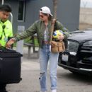 Kristen Stewart &#8211; Carries a ball as she arrives back in Los Angeles