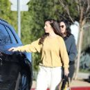 Minka Kelly – Picking up her dog from a friend’s home in Los Angeles
