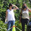Mila Kunis – Pick up her kids after swim class in Los Angeles