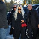 Kim Kardashian – Dressed in a black trench coat at Ritz Carlton hotel in New York