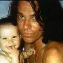 Michael Hutchence and his daughter Tiger Lily - 454 x 340