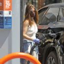 Kate Mara – Pumps gas in LA