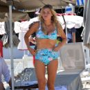Sophie Monk in Blue Bikini on a beach in Portofino