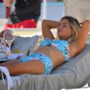 Sophie Monk in Blue Bikini on a beach in Portofino