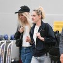 Kristen Stewart – With Dylan Meyer at JFK Airport in New York - 454 x 479