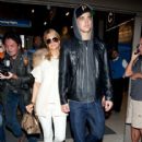 Paris Hilton and River Viiperi arrive at LAX (Los Angeles International Airport) - 416 x 594