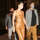 Kendall Jenner – In a skintight brown leather outfit with boyfriend Devin Booker in New York