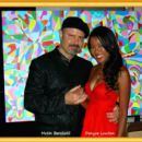 Multi-Talented and beautiful actress Denyce Lawton is enjoying a friendly moment in front of Metin Bereketli's original painting. - 454 x 402