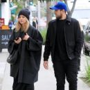 Mena Suvari is spotted walking with a friend during a lunch trip to M Cafe in Beverly Hills, California on February 21, 2017