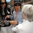 L'Wren Scott and Mick Jagger on the grid ahead of the Monaco F1 race, May 16, 2010 in Monte Carlo, Monaco - 454 x 302