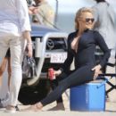 Pamela Anderson – Films Ultra Tune TV ad on Gold Coast Beach in Queensland