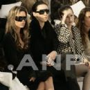 Victoria Beckham and L'Wren Scott attend the Chanel fashion show during Paris Fashion Week (Haute Couture) Spring/Summer 2006 on January 24, 2006 in Paris, France - 334 x 500