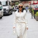 Ashley Roberts – Wearing white trousers and matching top in London - 454 x 681