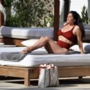 Casey Batchelor – In a brown bikini as she is seen on holiday in Ibiza - 454 x 396