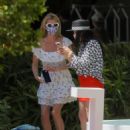 Paris and Nicky Hilton – Posing for pictures at W Hotel in Miami Beach