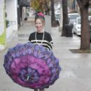 Claudia Wells – Shopping in the rain in Studio City - 454 x 681
