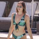 Raquel Leviss – Displays her green bikini at the pool in Scottsdale, Arizona