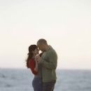 (left to right) Stacey Vetter (Jacqueline Obradors) and her husband Sean (Vin Diesel) dance along the beach in New Line Cinema’s action drama, A Man Apart.