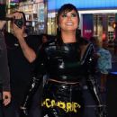 Demi Lovato – Taking photos on her digital Time Square billboard in New York - 454 x 681