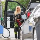 Avril Lavigne – Seen while refueling her truck at a gas station in Malibu