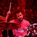 Jon Theodore of Queens of the Stone Age performs onstage during KROQ Almost Acoustic Christmas 2017 at The Forum on December 9, 2017 in Inglewood, California