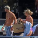 Caroline Stanbury – Seen In a purple bikini with her husband Sergio Carrallo at Mykonos - 454 x 302
