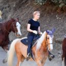 Amber Heard – Horseback riding candids in LA