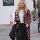 Sian Welby – In a tartan dress and tight fit black denim and boots in London - 454 x 681