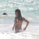 Michelle Rodriguez – In white bikini while vacationing in Tulum