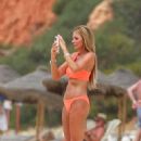 Toni Poole – In a bikini at the beach in Portugal - 454 x 681