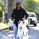 Billy Ray Cyrus takes his dogs out for a relaxing stroll through his neighborhood in Toluca Lake, California on April 4, 2014 - 453 x 594