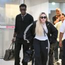 Madonna Arrives with Her Son David Banda at JFK Airport in New York