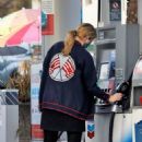 Mischa Barton – Fills the tank on her Range Rover in Los Feliz