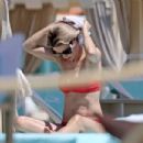 Michelle Hunziker – Seen in Red Bikini at Alpemare Beach in Forte Dei Marmi, Italy - 454 x 303
