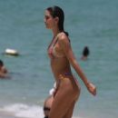 Gigi Paris – In a bikini hits the beach in Miami - 454 x 681