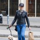 Julianna Margulies – Wearing a black biker’s leather jacket in Manhattan’s SoHo area - 454 x 667