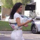 Kim Kardashian – Leaves office with glam squad in Los Angeles