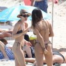 Aurora Ramazzotti – In a black bikini on holiday on the beach in Formentera - 454 x 682